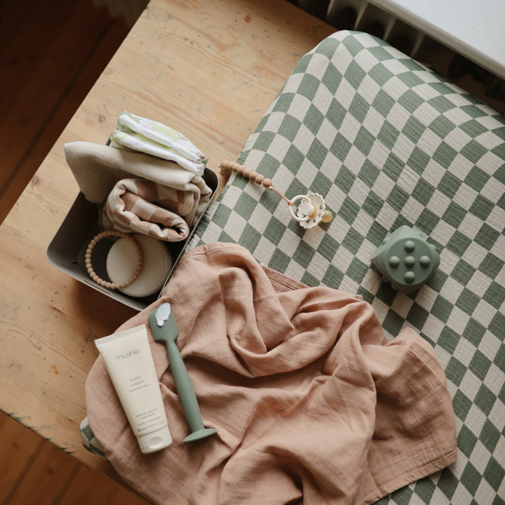 Applicateur de crème pour le change Baby Mushie