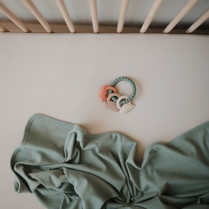 Anneau de dentition Baby Mushie Dino