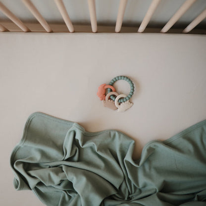 Anneau de dentition Baby Mushie Dino