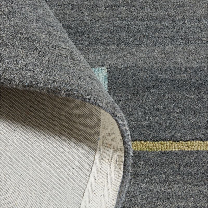 Terrain de football moderne pour enfants en laine colorée